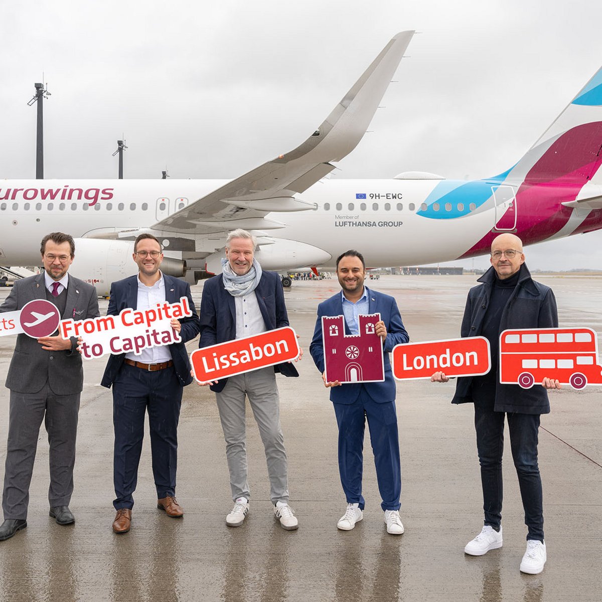Crew in front of an Eurowings aircraft to expand connections from BER