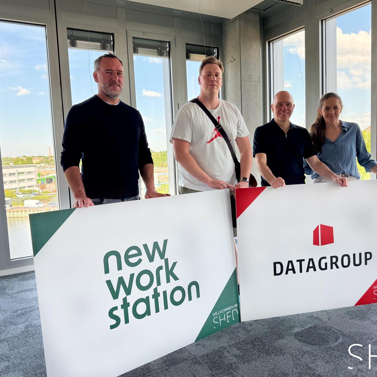 Various people from New Work Station and Datagroup in the rental space at SHED