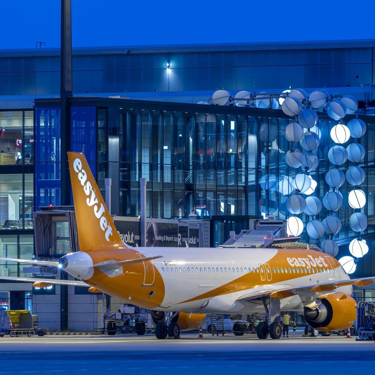 easyJet aircraft in front of Terminal 1 at Berlin Brandenburg Airport