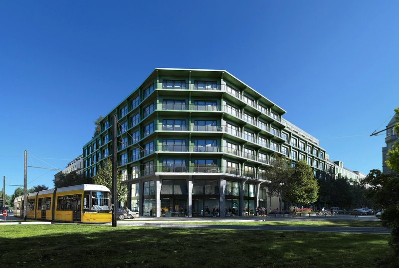 Photo of the HAINWERK office building in Berlin with a tram in the foreground