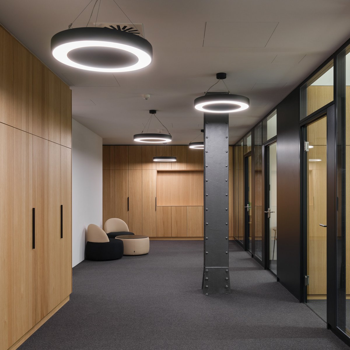 Photo of the office interior/entrance featuring modern lighting