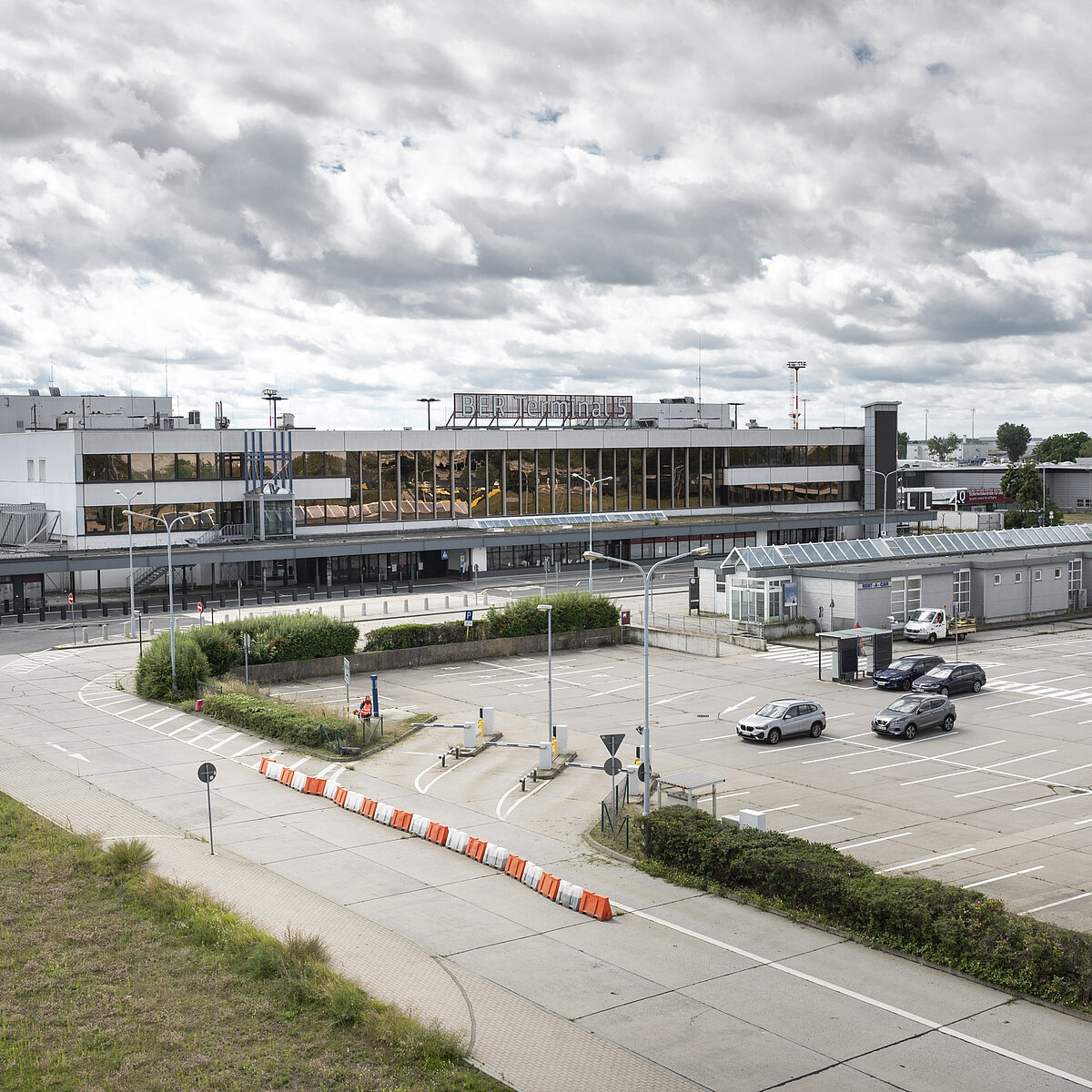 Design competition for Quartier SXF 2.0 started at BER. Aerial view of the airport area including the old terminal.