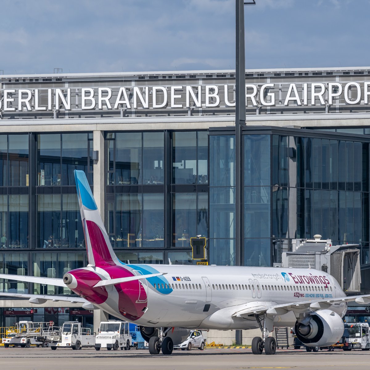 Eurowings aircraft at BER in front of Terminal 1 on the apron