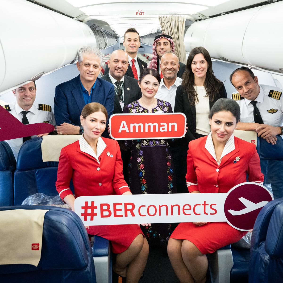 Crew photo in the aircraft with the following people: Fayez Khoury, Ambassador-designate of the Hashemite Kingdom of Jordan (2nd from left), Yazan Ardah, Station Manager BER, Royal Jordanian Airlines (3rd from left) and Sara Ruiz Padovan, Business Development Aviation, Flughafen Berlin Brandenburg GmbH (3rd from right) surrounded by crew.