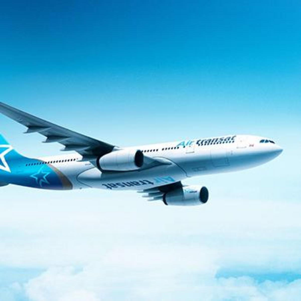 Picture shows aircraft of the Canadian airline Air Transat in the air.
