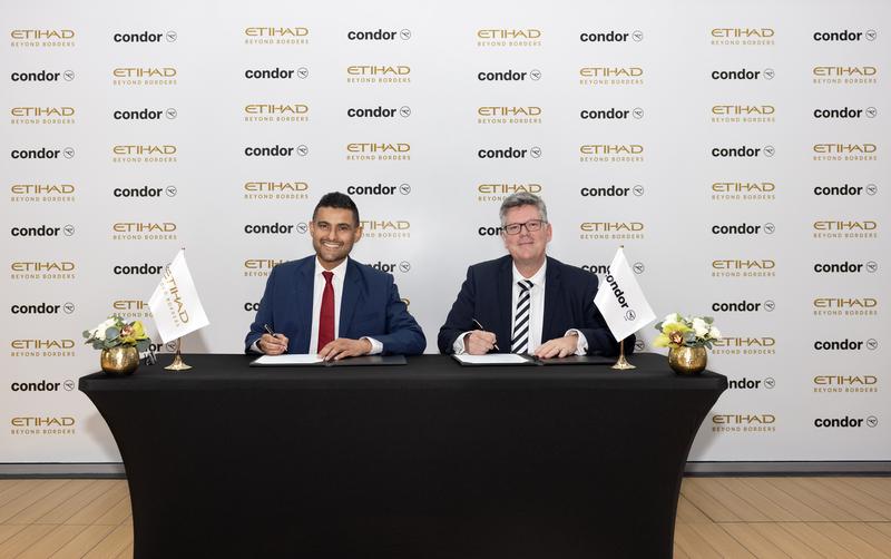 At the signing of the codeshare agreement, the following individuals are at the table: Arik De, Chief Revenue and Commercial Officer, Etihad Airways | Jens Boyd, Commercial Director and Member of the Executive Committee, Condor