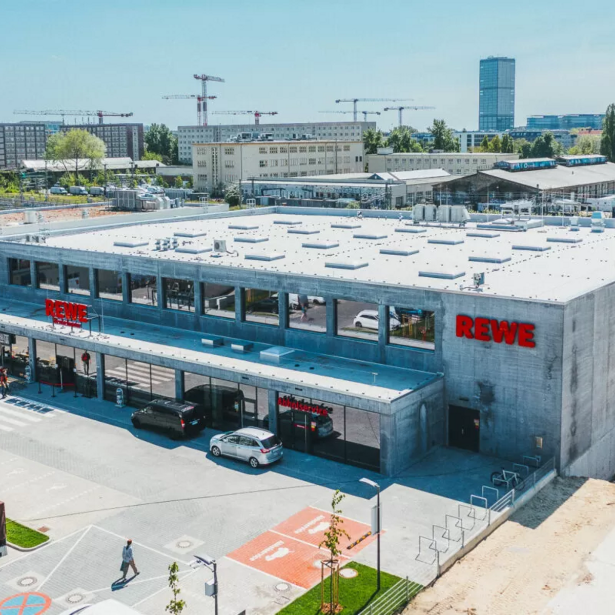 new Rewe supermarket made of infralight concrete | bird's eye view 