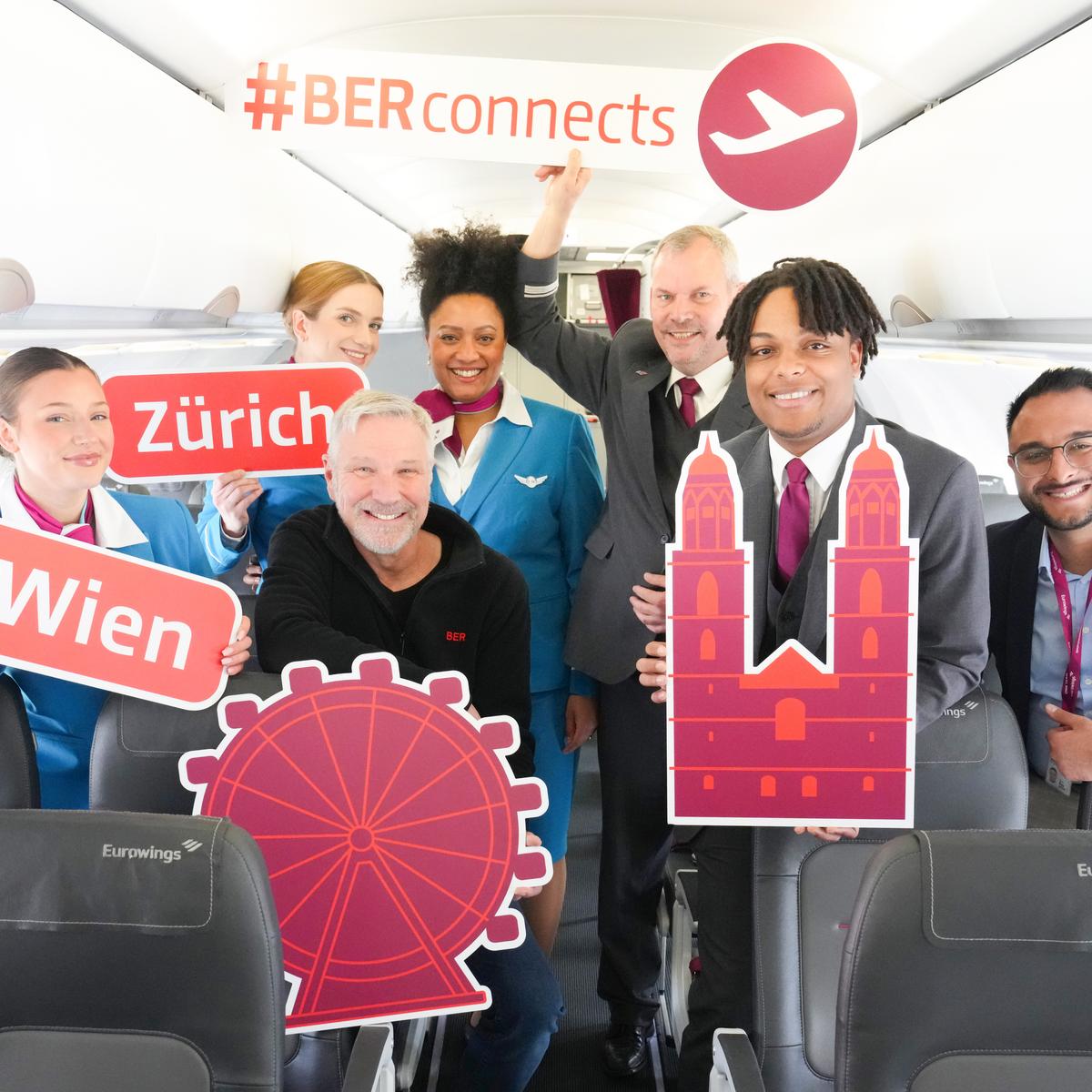 Crew photo of Eurowings expanding its flight offering with Andreas Ley, Senior Manager Business Development Aviation, Flughafen Berlin Brandenburg GmbH (3rd from left) and Kevin Berisha, Network Management & Airport Relations, Eurowings (1st from right) surrounded by crew.