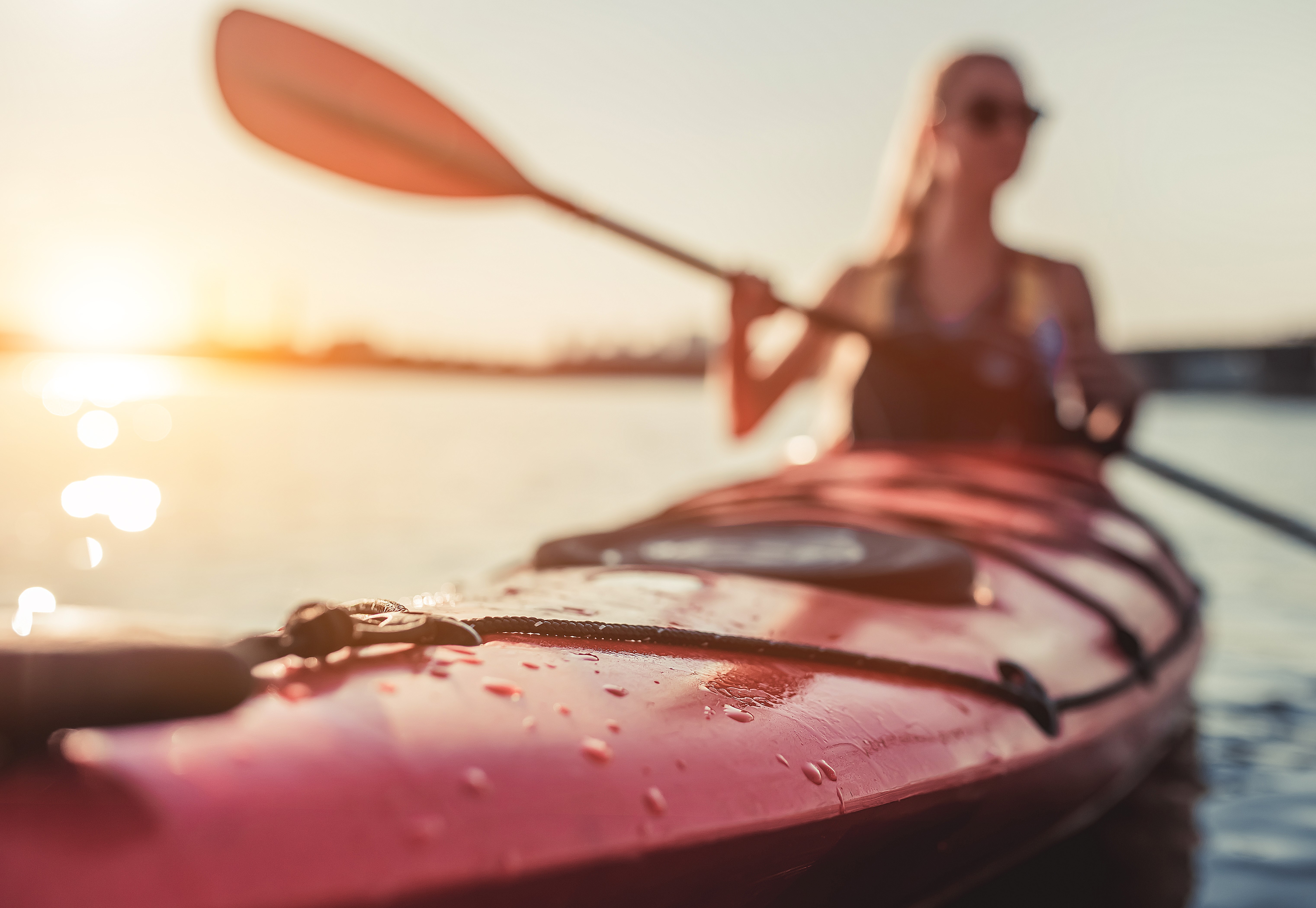 Woman in canoe, © istock/Vasyl Dolmatov